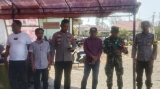 Camat Bungku Barat, Muhdar Da'ami dalam giat Pemilihan BPD Desa Larobenu, Minggu 13 September 2026. | Foto: Zain Said.